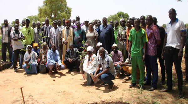 A group of people posing for a photograph 